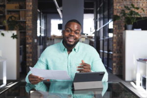 "A small business owner reviewing documents needed to qualify for a working capital loan.