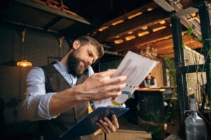 man looking at his companies financials